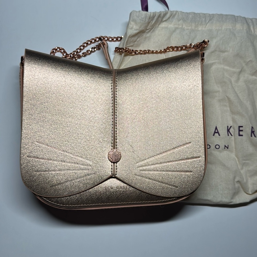 Ted baker cat bag , used , not clean inside, has little scratches outside